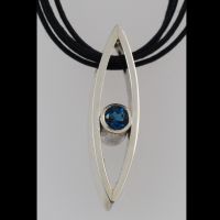Silver pendant set with topaz